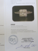 Pierścionek z diamentem princessa 1,06ct i brylantami 0,12ct